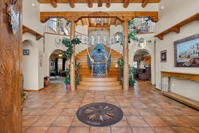 lobby with visible vents and stairway