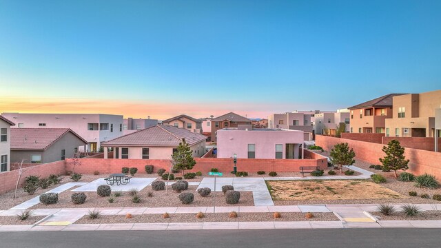 8717 Sevano Cir NE, Albuquerque, NM 87113 - back of property featuring stucco siding and a patio area