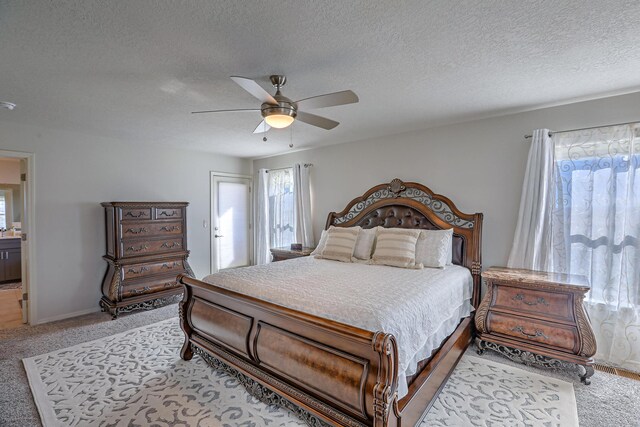 8717 Sevano Cir NE, Albuquerque, NM 87113 - bedroom featuring carpet floors, a textured ceiling, and a ceiling fan