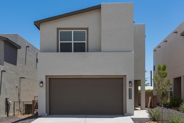 9620 Sage Ranch Ct SW, Albuquerque, NM 87121 - view of front of property with stucco siding, an attached garage, and concrete driveway