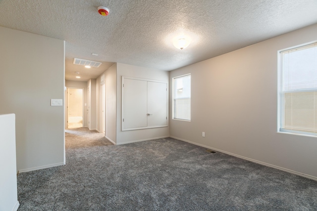 9600 Sage Ranch Ct SW, Albuquerque, NM 87121 - empty room with carpet, a textured ceiling, and recessed lighting