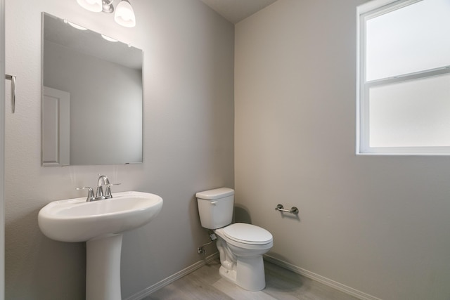 9600 Sage Ranch Ct SW, Albuquerque, NM 87121 - half bath with wood finished floors and healthy amount of natural light