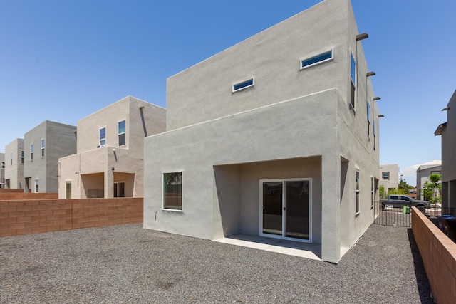9600 Sage Ranch Ct SW, Albuquerque, NM 87121 - rear view of property with stucco siding