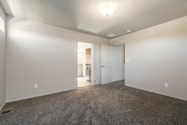 9600 Sage Ranch Ct SW, Albuquerque, NM 87121 - carpeted empty room featuring baseboards and a textured ceiling