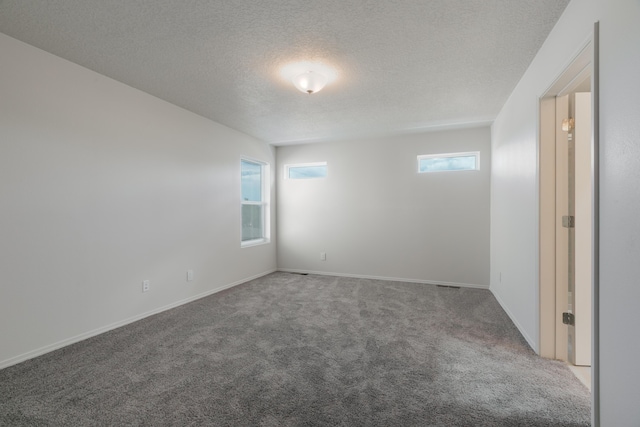 9504 Sage Ranch Ct SW, Albuquerque, NM 87121 - empty room with carpet and a textured ceiling