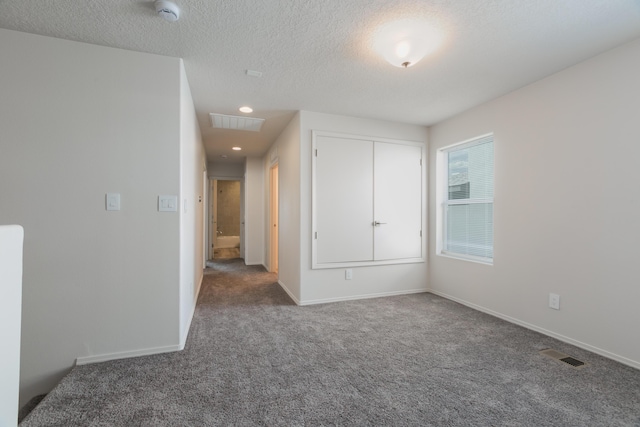 9504 Sage Ranch Ct SW, Albuquerque, NM 87121 - unfurnished bedroom with carpet floors, a textured ceiling, and recessed lighting
