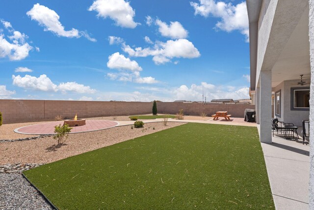 460 Rio Chama Cir SW, Los Lunas, NM 87031 - view of yard featuring a patio area and an outdoor fire pit