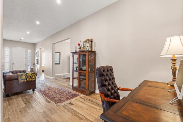 460 Rio Chama Cir SW, Los Lunas, NM 87031 - home office with recessed lighting, light wood finished floors, and baseboards