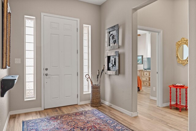 460 Rio Chama Cir SW, Los Lunas, NM 87031 - foyer entrance with light wood-style floors and baseboards