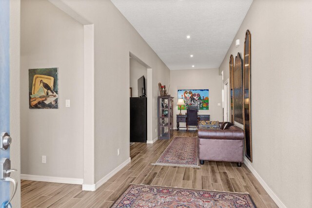 460 Rio Chama Cir SW, Los Lunas, NM 87031 - foyer entrance with wood finished floors, baseboards, and recessed lighting