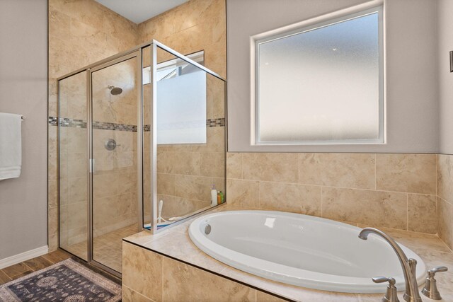 460 Rio Chama Cir SW, Los Lunas, NM 87031 - full bath featuring plenty of natural light, a bath, and a stall shower