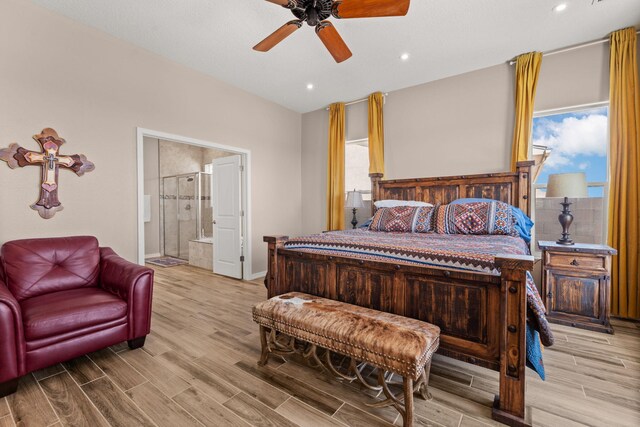 460 Rio Chama Cir SW, Los Lunas, NM 87031 - bedroom with wood finished floors, ensuite bathroom, recessed lighting, baseboards, and ceiling fan