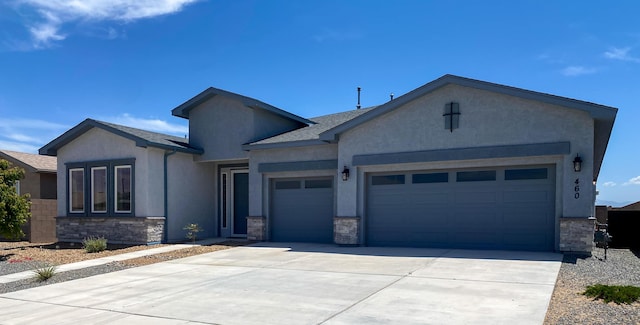460 Rio Chama Cir SW, Los Lunas, NM 87031 - single story home with stone siding, an attached garage, and stucco siding