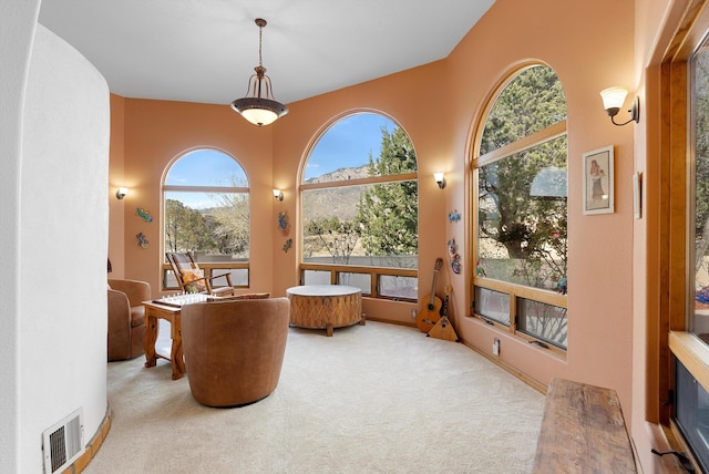 1125 Marigold Dr NE, Albuquerque, NM 87122 - carpeted home office with visible vents and a healthy amount of sunlight