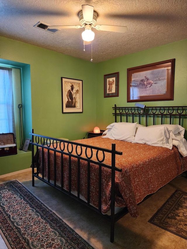 404 Pyrite Dr NE, Rio Rancho, NM 87124 - bedroom with a textured ceiling and a ceiling fan