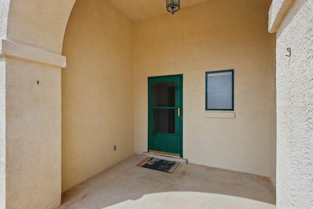 404 Pyrite Dr NE, Rio Rancho, NM 87124 - property entrance with stucco siding