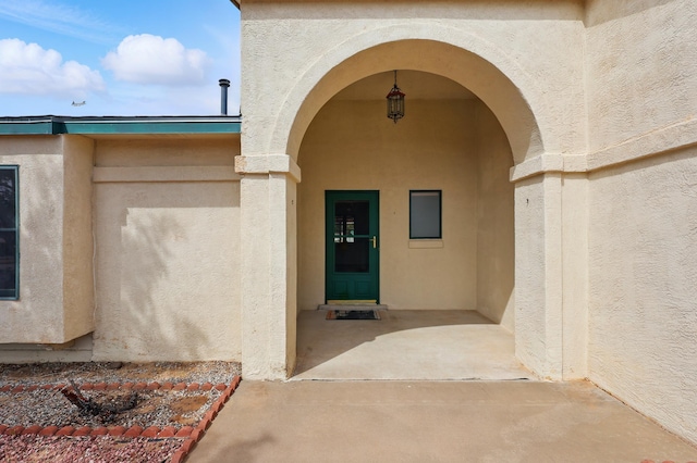 404 Pyrite Dr NE, Rio Rancho, NM 87124 - property entrance with stucco siding
