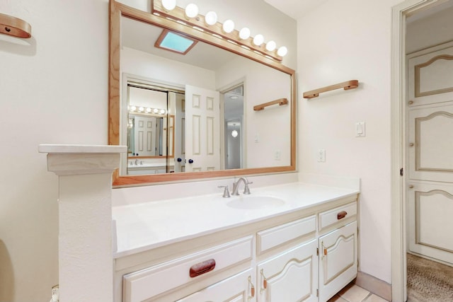 7827 Academy Trl NE, Albuquerque, NM 87109 - bathroom featuring vanity and tile patterned flooring