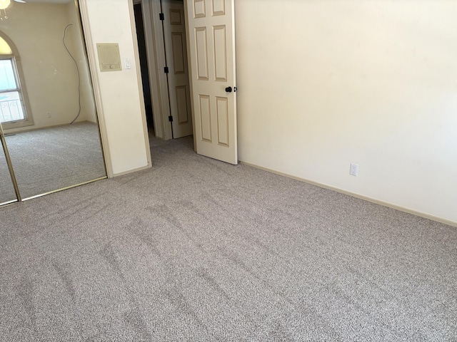 7827 Academy Trl NE, Albuquerque, NM 87109 - unfurnished bedroom with carpet flooring and baseboards