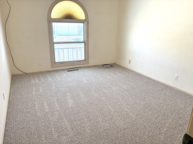 7827 Academy Trl NE, Albuquerque, NM 87109 - spare room featuring carpet floors