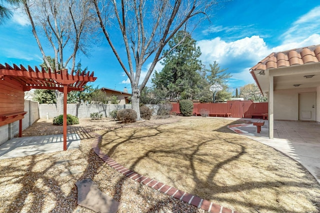 7827 Academy Trl NE, Albuquerque, NM 87109 - fenced backyard with a patio and a pergola