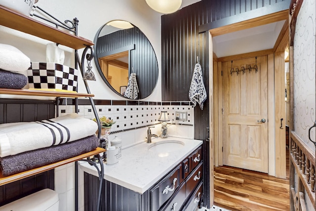 2544 Sandia Loop NE, Rio Rancho, NM 87144 - bathroom featuring backsplash, wood finished floors, and vanity