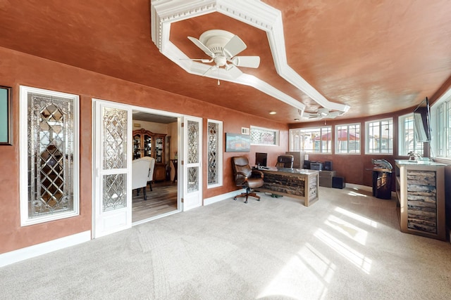 office featuring baseboards, a ceiling fan, and carpet flooring