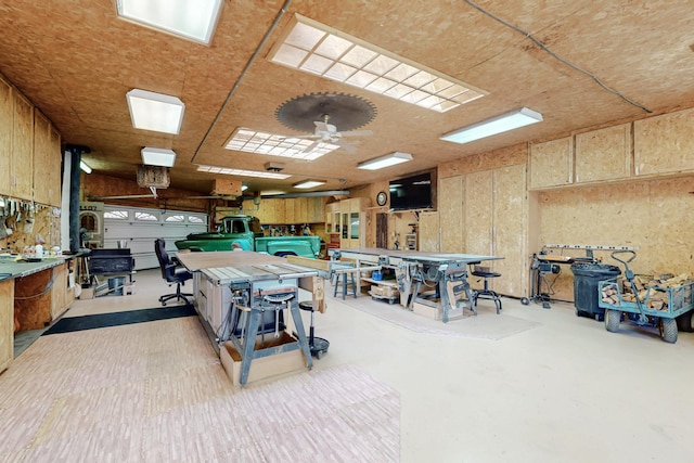 misc room with a workshop area
