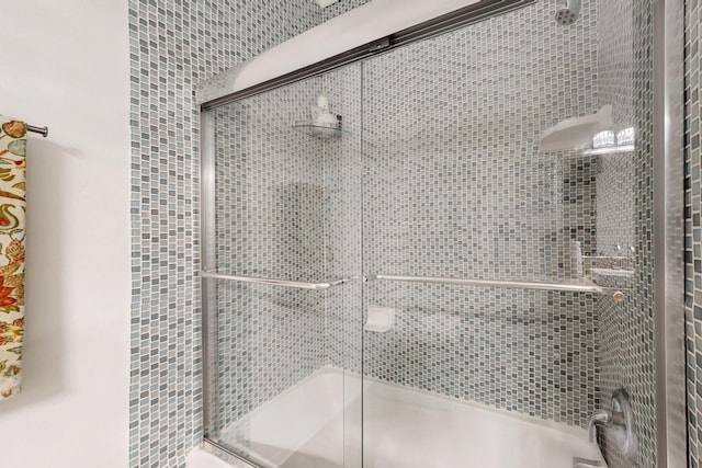 full bath featuring a shower stall