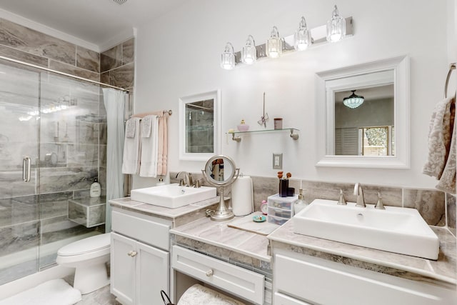 full bathroom featuring a sink and a stall shower