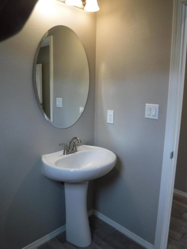 bathroom featuring baseboards