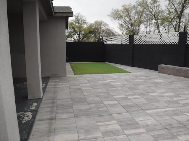 view of patio featuring a fenced backyard