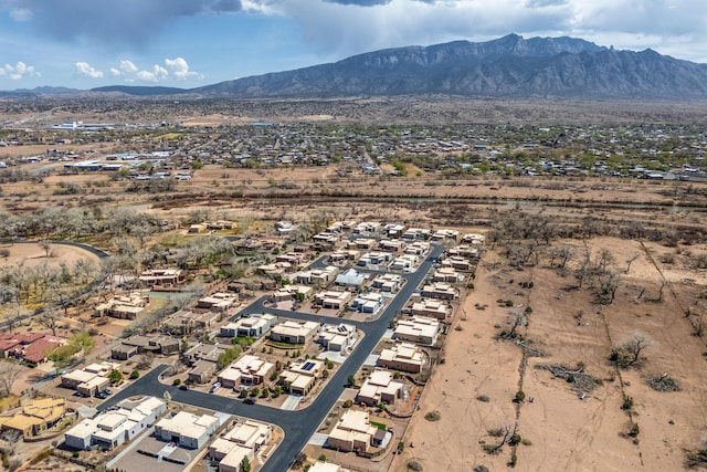 drone / aerial view featuring a mountain view and a residential view