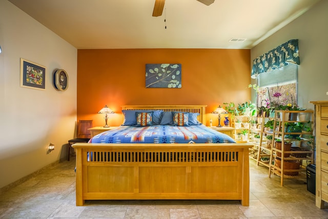 bedroom featuring visible vents and a ceiling fan
