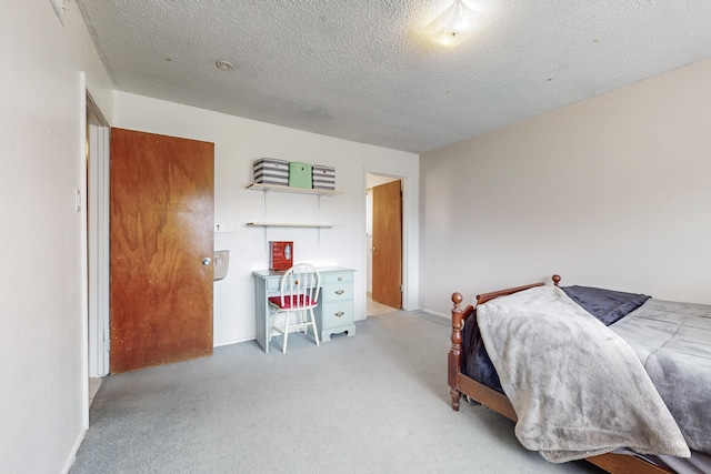 5208 Simon Dr NW, Albuquerque, NM 87114 - carpeted bedroom with a textured ceiling