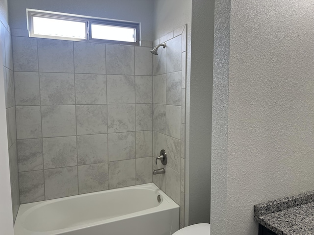 6016 N Sandia Ct, Rio Rancho, NM 87144 - full bathroom featuring  shower combination, a textured wall, and toilet