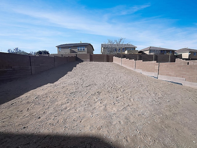 7110 Wasilla Dr NE, Rio Rancho, NM 87144 - view of yard with a fenced backyard