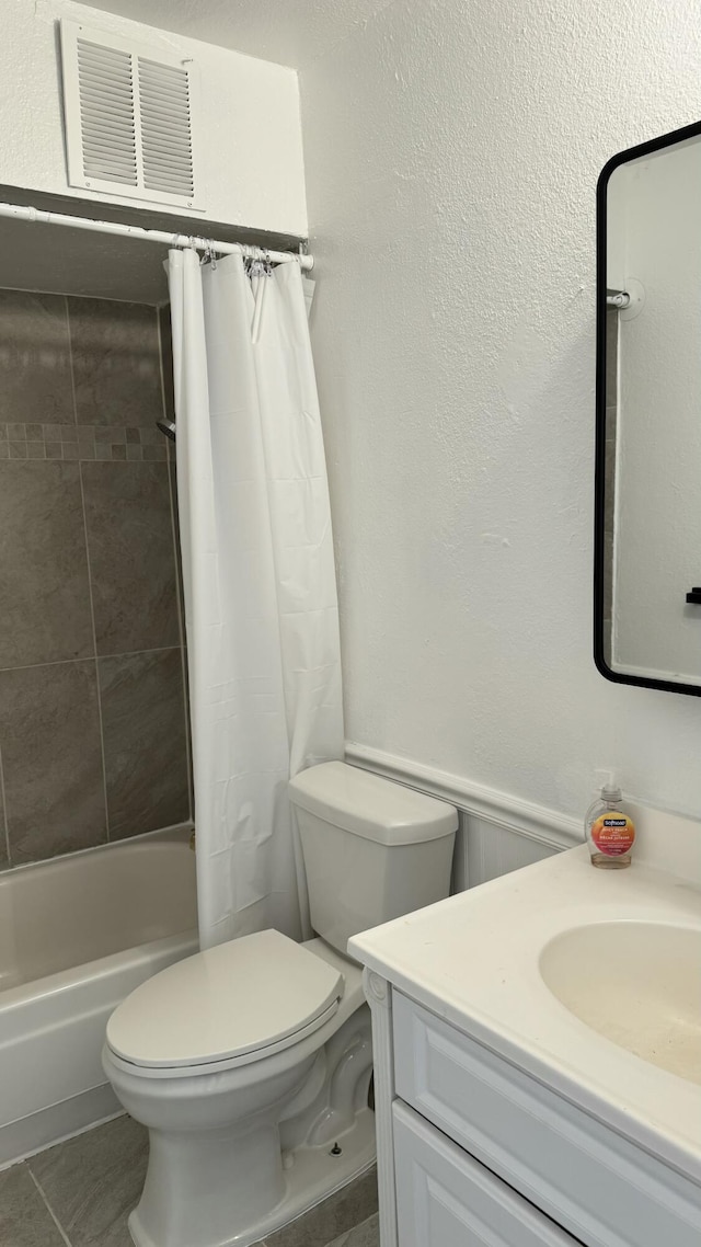 3839 Montgomery Blvd NE Unit 724, Albuquerque, NM 87109 - bathroom with tile patterned flooring, vanity, shower / bathtub combination with curtain, toilet, and visible vents