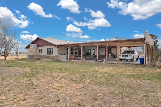 69 Midway Rd, Lemitar, NM 87823 - rear view of property with a carport