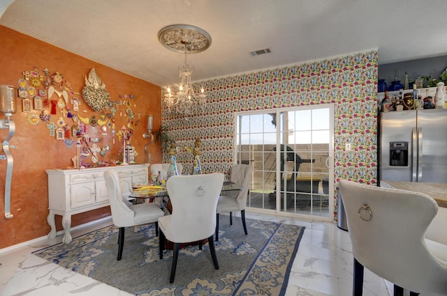 4844 Stafford Pl NW, Albuquerque, NM 87120 - dining space featuring an inviting chandelier, marble finish floor, and visible vents