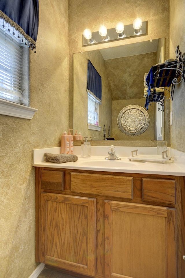 4844 Stafford Pl NW, Albuquerque, NM 87120 - bathroom featuring vanity and a textured wall