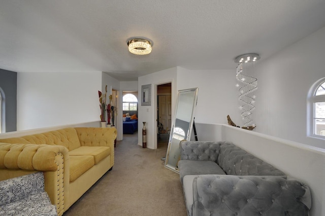 4844 Stafford Pl NW, Albuquerque, NM 87120 - living area with a textured ceiling and light carpet