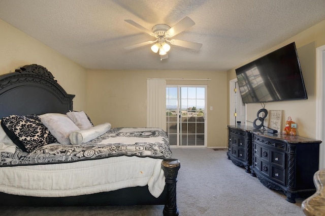 4844 Stafford Pl NW, Albuquerque, NM 87120 - bedroom with a ceiling fan, access to outside, light colored carpet, and a textured ceiling