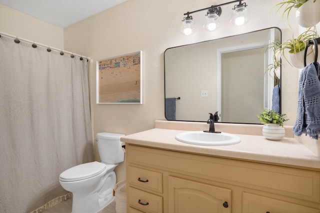 6624 Conrad Ave NW, Albuquerque, NM 87120 - full bathroom featuring toilet, vanity, and a shower with curtain