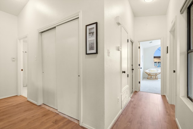 6624 Conrad Ave NW, Albuquerque, NM 87120 - corridor with light wood-style floors
