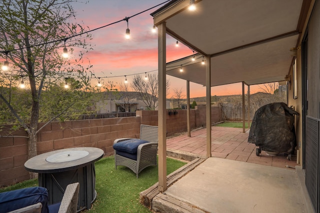 6624 Conrad Ave NW, Albuquerque, NM 87120 - patio terrace at dusk with a fenced backyard