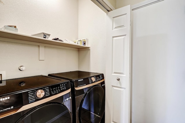2467 Corvara Dr SE, Rio Rancho, NM 87124 - laundry room featuring washer and dryer