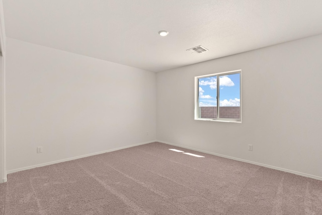 2522 Desi Loop, Belen, NM 87002 - empty room with carpet floors and baseboards