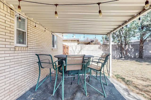 view of patio / terrace with a fenced backyard and outdoor dining space