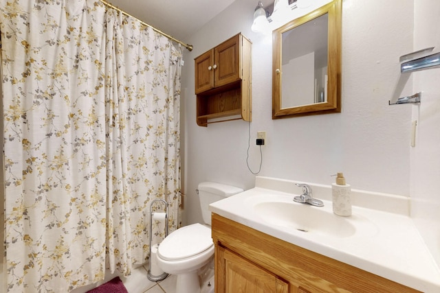 bathroom featuring curtained shower, toilet, and vanity